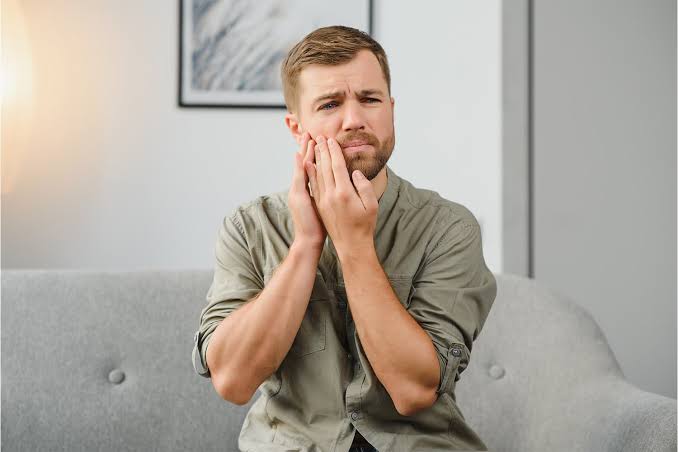 how to tighten a loose tooth at home
